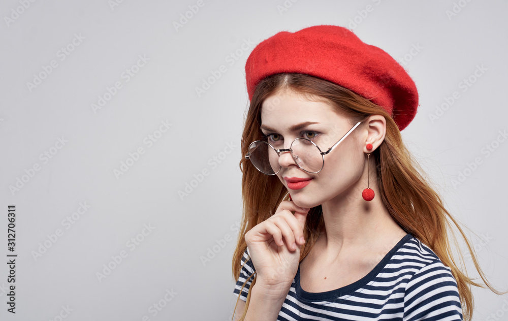 portrait of young woman in red hat portrait of young woman in red hat