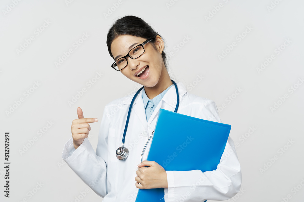 portrait of a female doctor with stethoscope portrait of a female doctor with stethoscope