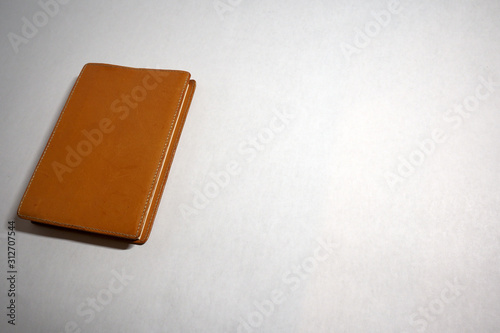 Foto A handmade book jacket on the book with a white background