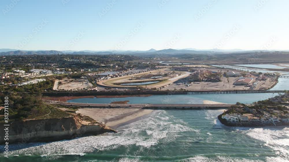 Del mar beach and racetrack aerial sunrise Inspire 2 H.264 Zoom out and flying backward motion. medium to High angle. San Diego, California
