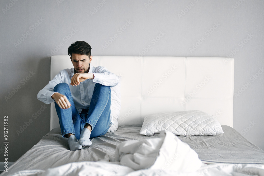 man sitting on sofa with laptop man sitting on sofa with laptop