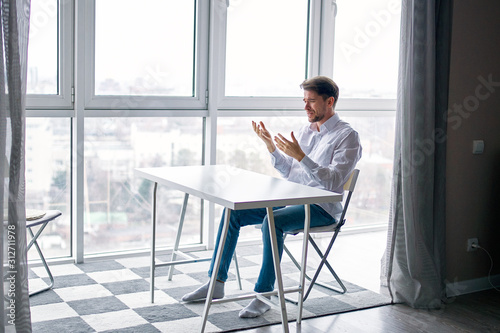 businessman sitting at table in office