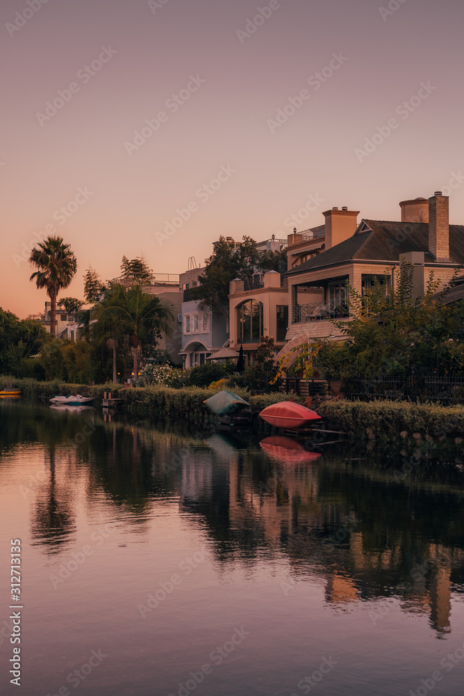 Canal and houses at sunset, in Venice Beach, Los Angeles, California