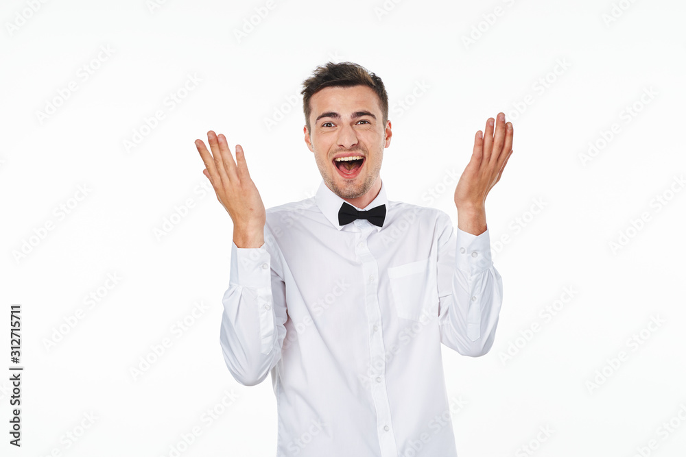 young man with arms raised young man with arms raised