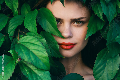 beautiful woman green leaves nature