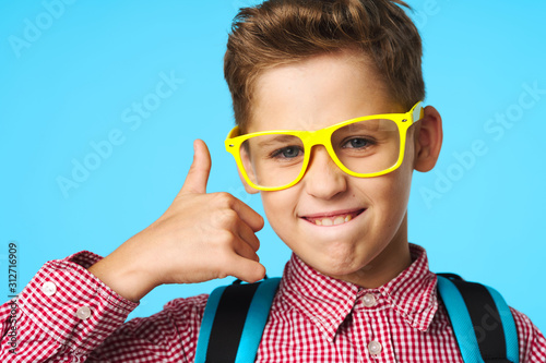 portrait of boy in glasses