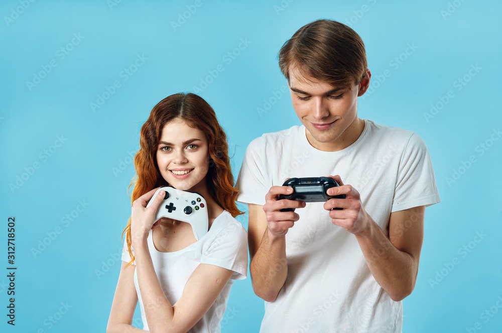 young couple taking picture of themselves with mobile phone young couple taking picture of themselves with mobile phone