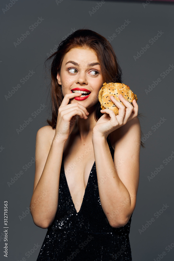 young woman eating cake