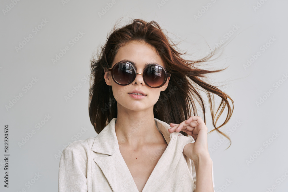 portrait of young woman in sunglasses portrait of young woman in sunglasses