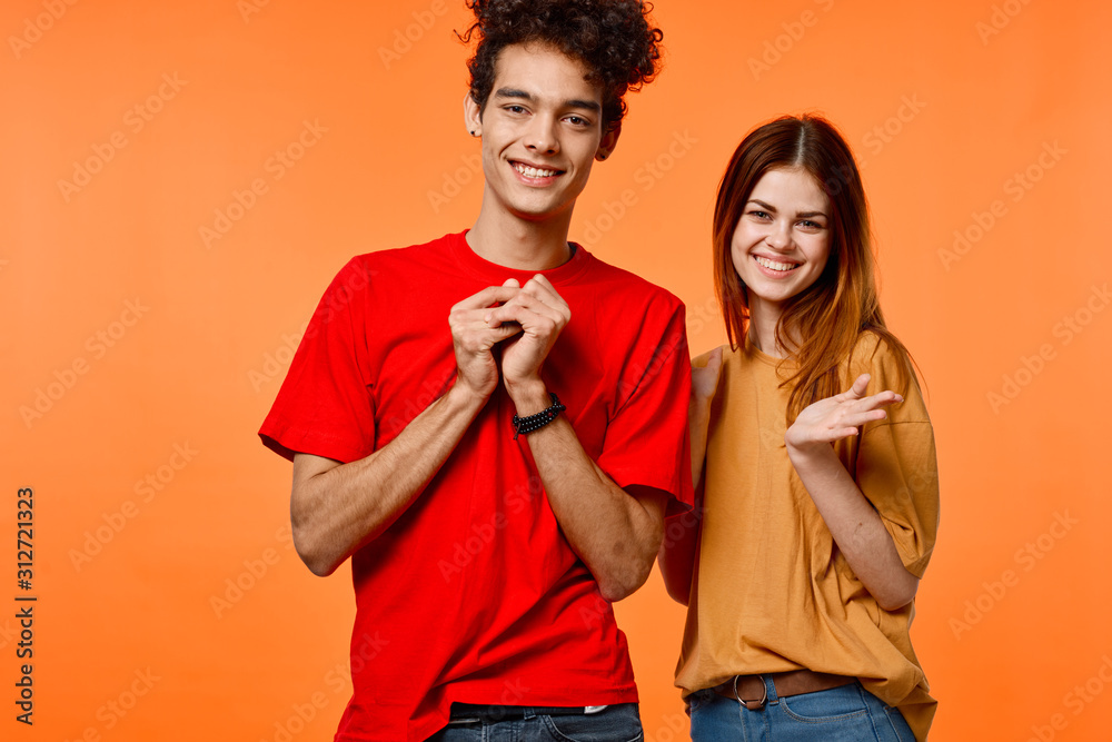 Fototapeta premium young couple in t-shirts chatting