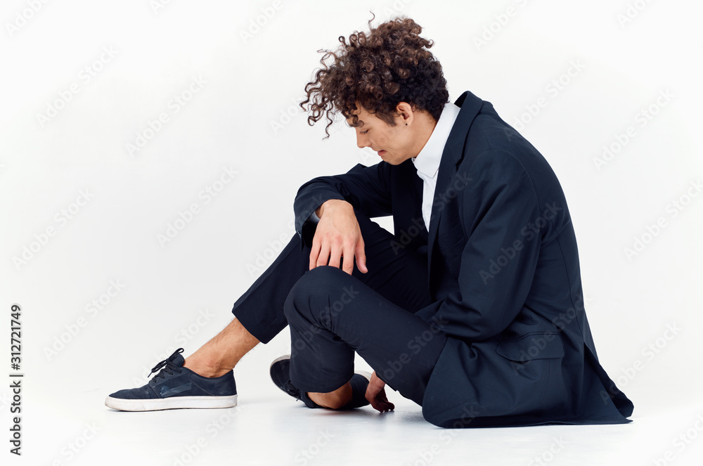 businessman sitting on the floor with laptop businessman sitting on the floor with laptop