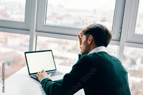 man with laptop © SHOTPRIME STUDIO