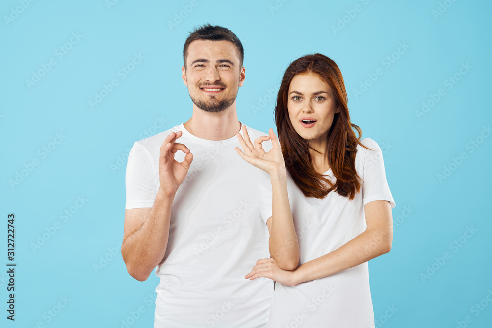 happy couple with thumbs up happy couple with thumbs up