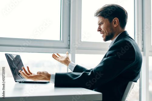 businessman working on laptop in office