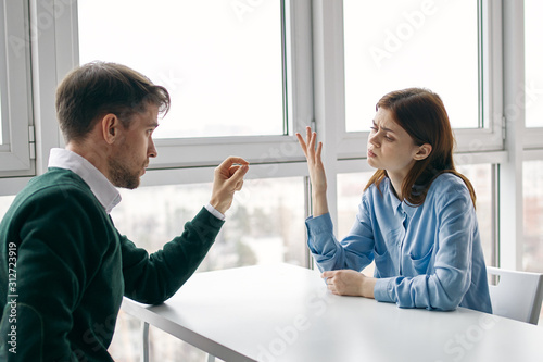 man and woman shaking hands