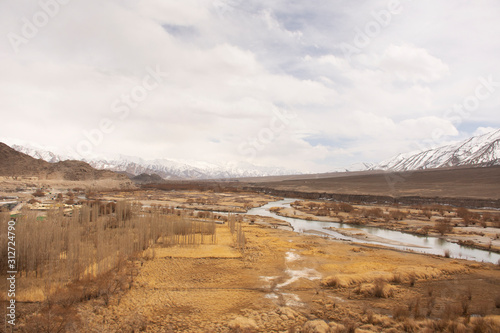 Viewpoint landscape of hight range mountain with Confluence of the Indus and Zanskar Rivers on Srinagar Leh Ladakh highway at Leh Ladakh village in Jammu and Kashmir, India at winter season