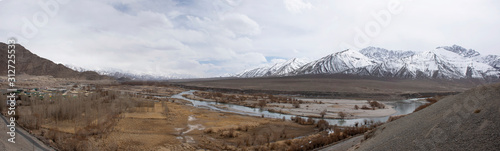 Viewpoint landscape of hight range mountain with Confluence of the Indus and Zanskar Rivers on Srinagar Leh Ladakh highway at Leh Ladakh village in Jammu and Kashmir, India at winter season