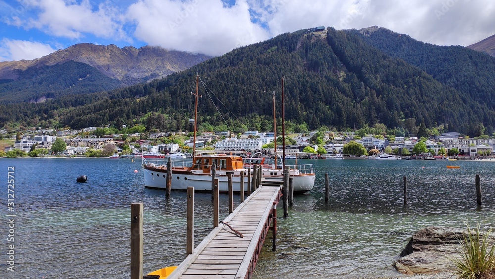 Beautiful center of Queenstown famous tourist place beautiful gorgeous Wakatipu lake Remarkable mountain range city with pubs and restaurants South island New Zealand 