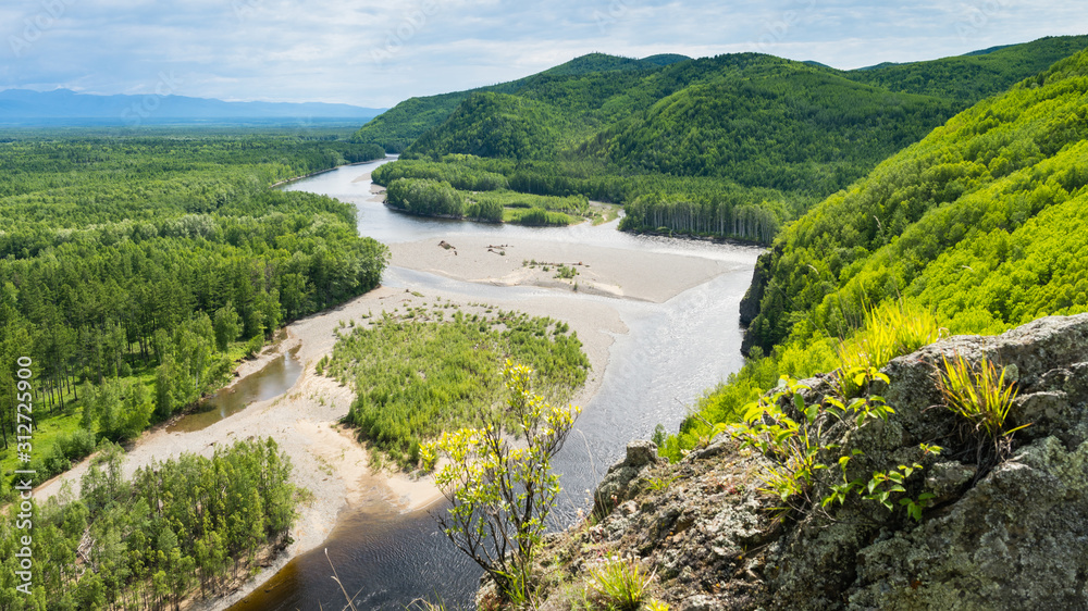 Mountain River Valley Amgun. Khabarovsk Krai in the Russian Far East. Amgun river views of the beautiful. Mountain River Valley Amgun. Khabarovsk Krai in the Russian Far East. Amgun river views of the beautiful.