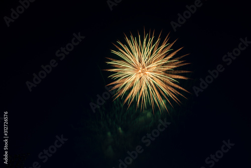 Yellow and orange fireworks at New Year celebration