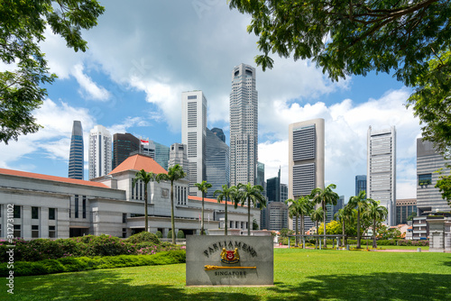 Singapore Parliament building in front of Singapore business district skyline financial downtown building at Marina Bay, Singapore. Asian tourism, modern city life, or business finance  photo