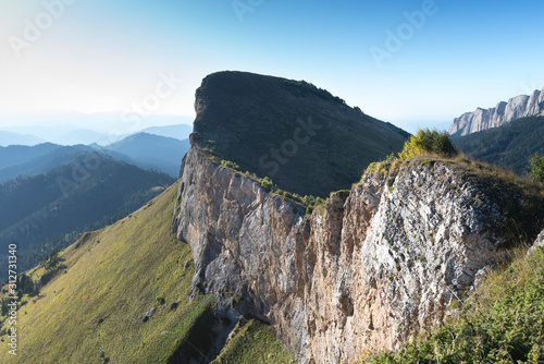 Caucasian mountains of the Republic of Adygea, Krasnodar region. South of Russia. Beautiful foothills of the Caucasus. Thach Nature Park.  Achenbuk mountain. photo