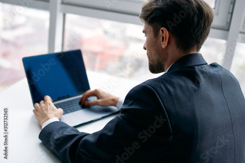 businessman working on tablet computer in office
