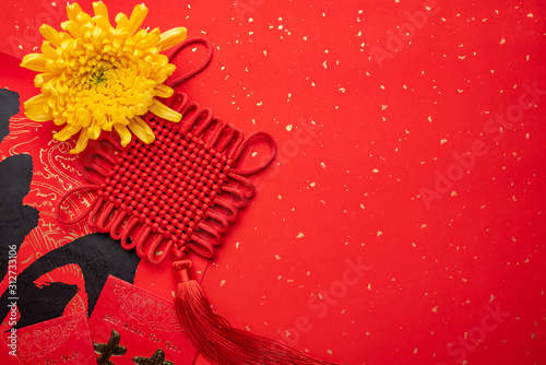 Chinese spring festival blessing and ruyi knot chrysanthemum background photo