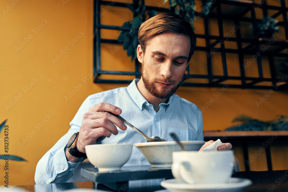 young man in cafe young man in cafe
