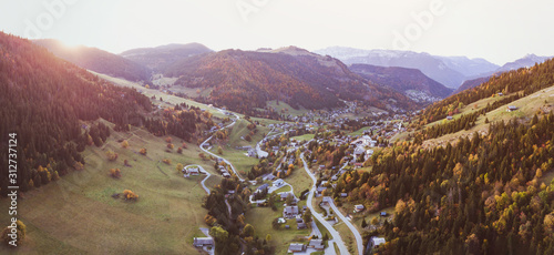 aerial drone panoramic autumn landscape of La Clusaz village, french Alps, mountains in France, Europe photo