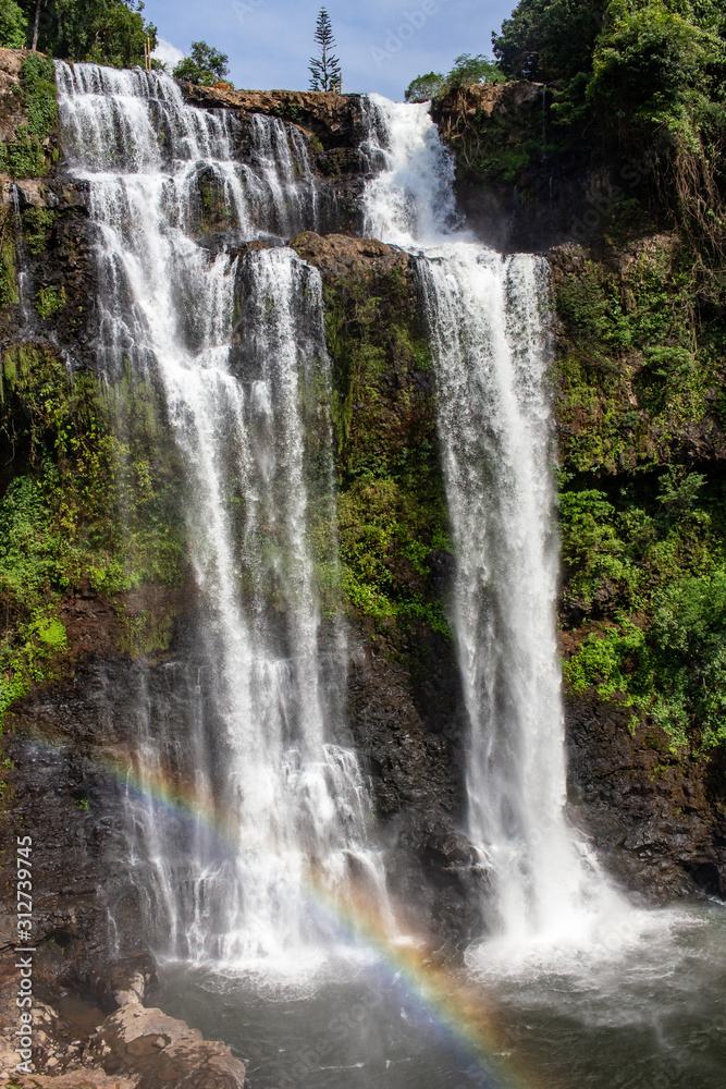 Tad Yuang Waterfall with rainbow in Lao