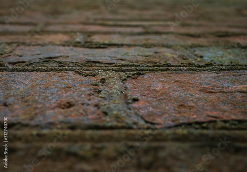 Very old brick wall closeup