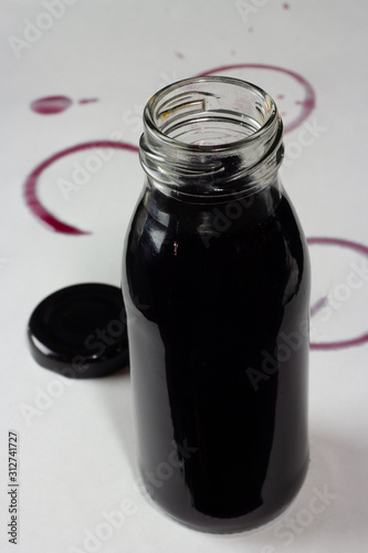 red wine in small bottle