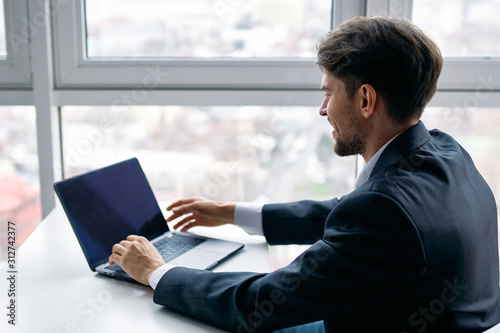 businessman working on laptop in office