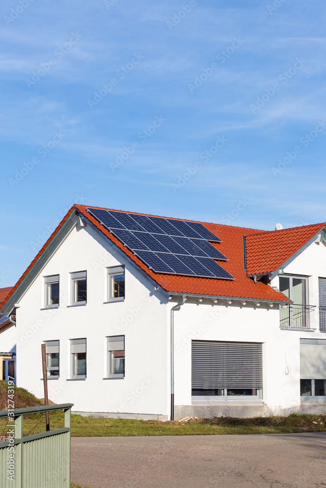 solar panels on a rooftop of a new building solar panels on a rooftop of a new building