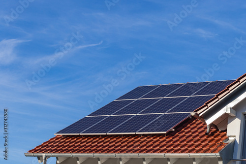 solar panels on a rooftop of a new building