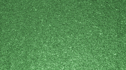 Green glitter texture background for Christmas and Saint Patrick’s day holiday decoration metallic wallpaper backdrop design