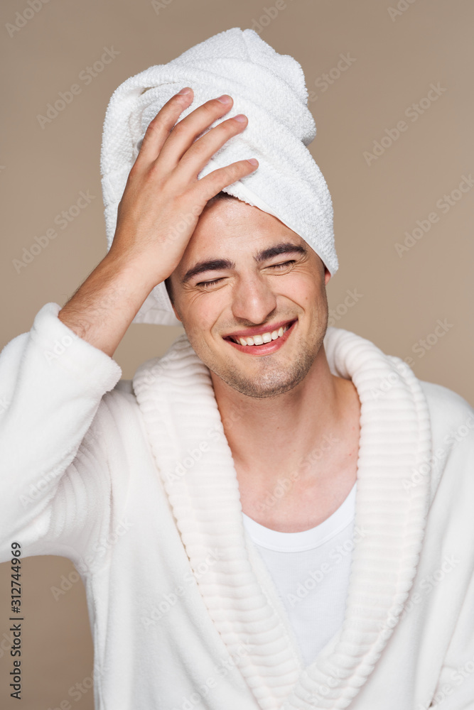 portrait of a man with towel on his head portrait of a man with towel on his head