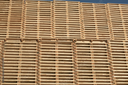 Piles of euro type cargo pallets, transportation, wooden wallpaper