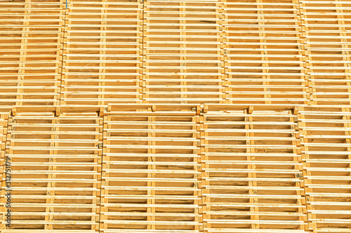 Piles of euro type cargo pallets, transportation, wooden wallpaper
