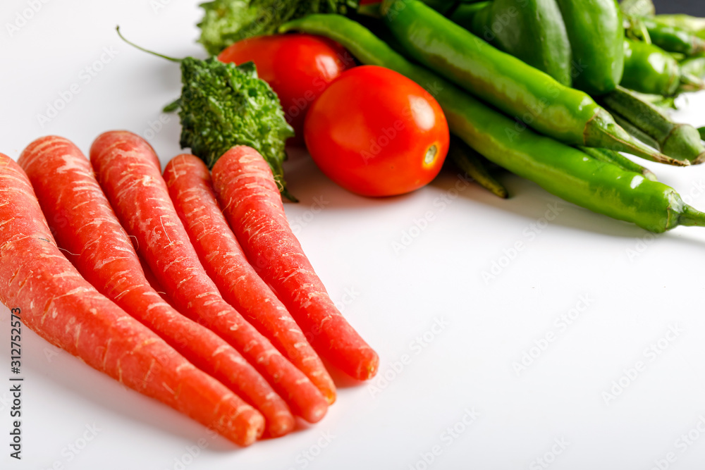 Raw vegetable on white background with copy space Raw vegetable on white background with copy space