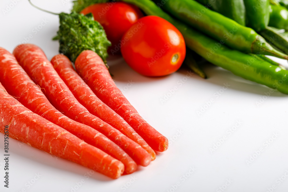 Raw vegetable on white background with copy space Raw vegetable on white background with copy space