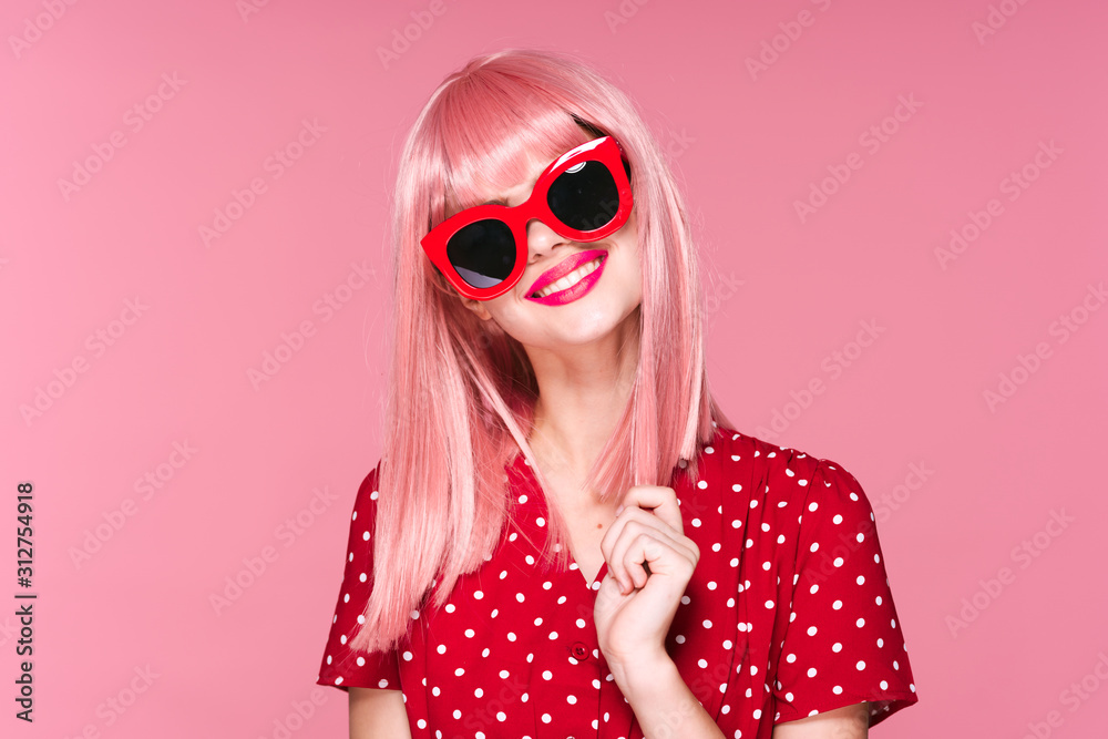 Fototapeta premium portrait of a girl in pink glasses