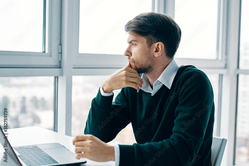 businessman talking on phone in office businessman talking on phone in office