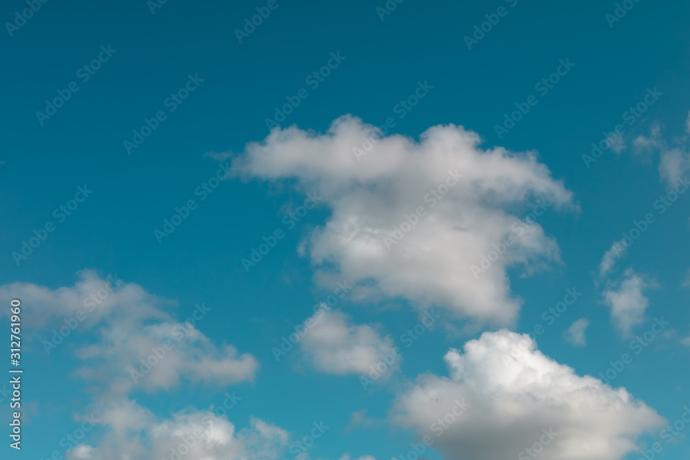 Beautiful blue sky with fluffy clouds Beautiful blue sky with fluffy clouds