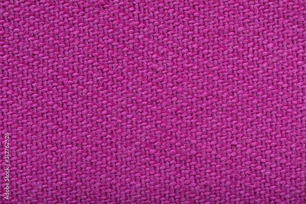 twill weaving fabric, pink stitches as pattern, tissue structure closeup. twill weaving fabric, pink stitches as pattern, tissue structure closeup.