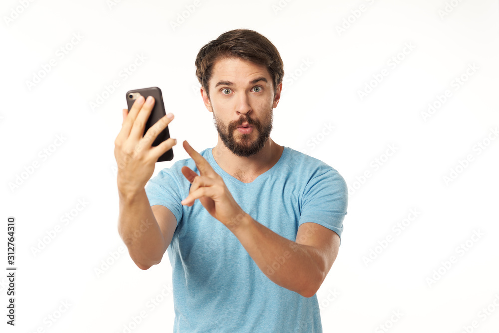 young man using mobile phone young man using mobile phone