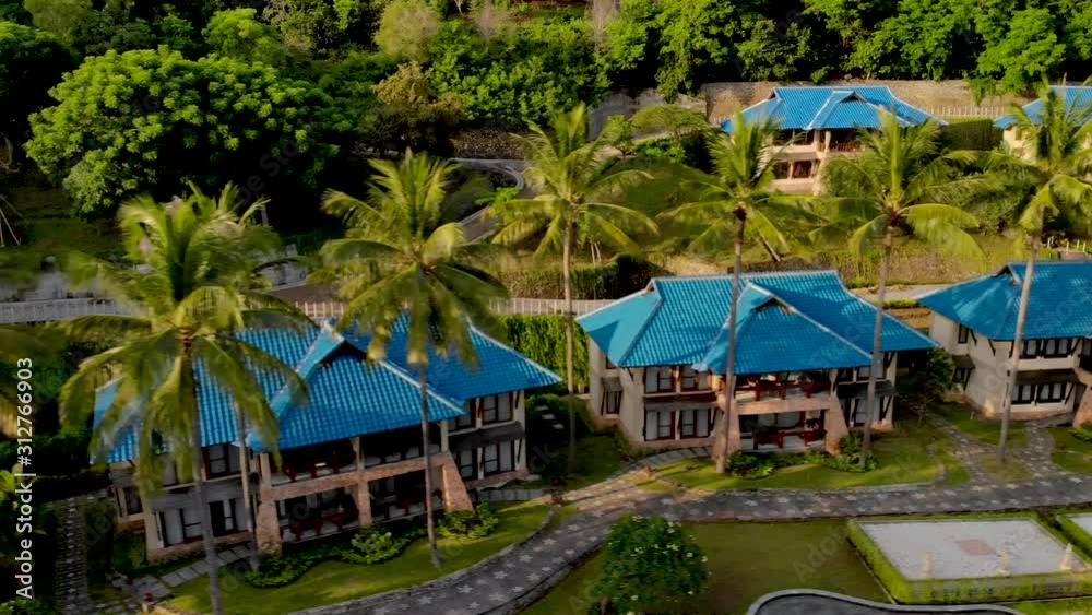 Aerial flight over luxury resort villas in Lombok, Indonesia. Aerial flight over luxury resort villas in Lombok, Indonesia.