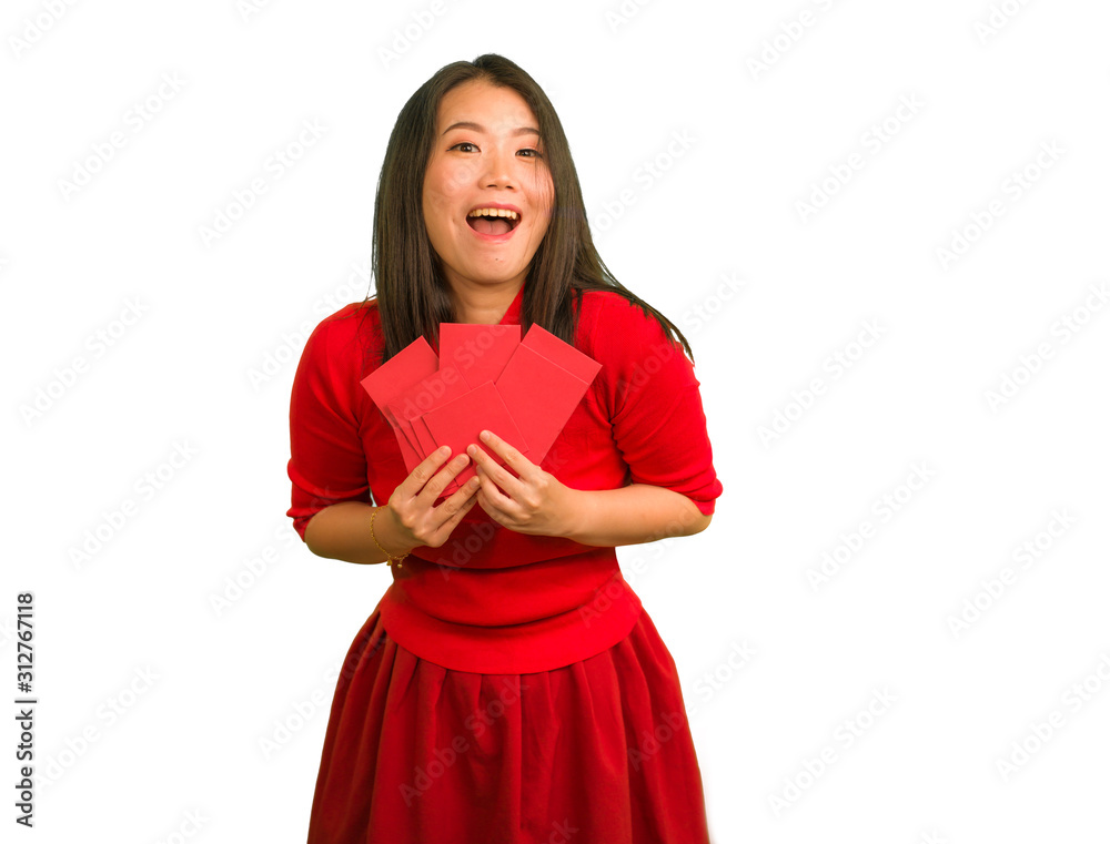 young beautiful and happy Asian Korean woman in traditional New Year red dress and hair bun holding red pocket envelopes with money enjoying cheerful the blessing young beautiful and happy Asian Korean woman in traditional New Year red dress and hair bun holding red pocket envelopes with money enjoying cheerful the blessing