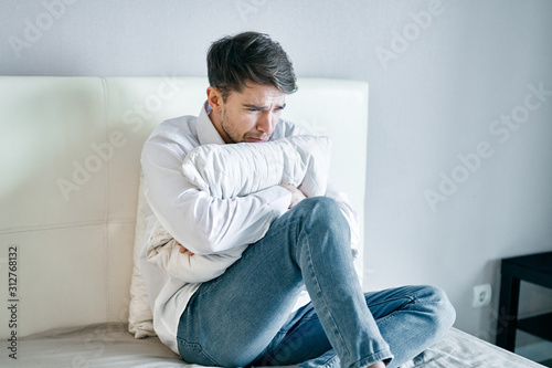 young man sitting on sofa